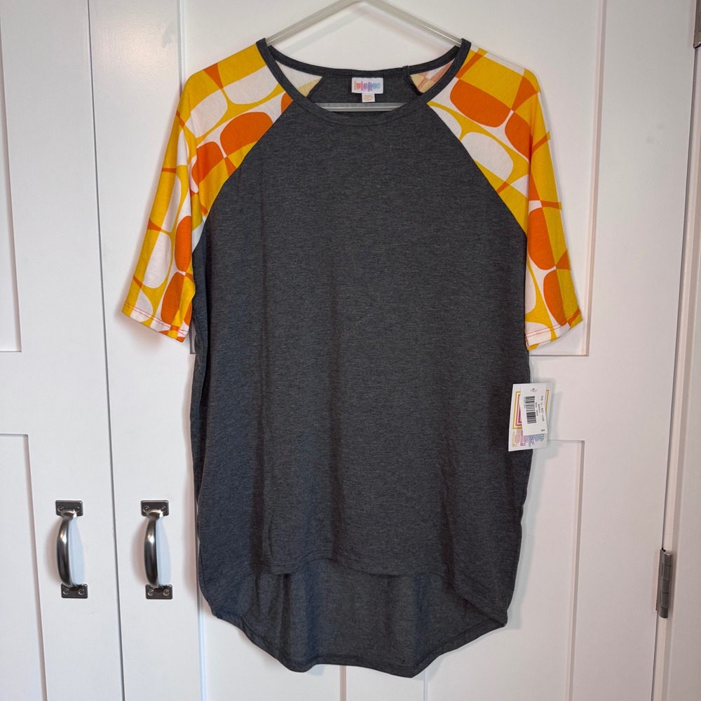 NWT LuLaRoe Irma Oversized Baseball T-Shirt Multicolor Candy Corn Geometric XXS